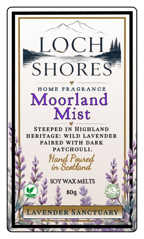Front-facing product label for Loch Shores Home Fragrance 'Moorland Mist' soy wax melts, featuring a cream background with black and purple typography, mountain and lake artwork, lavender illustrations, and a border.